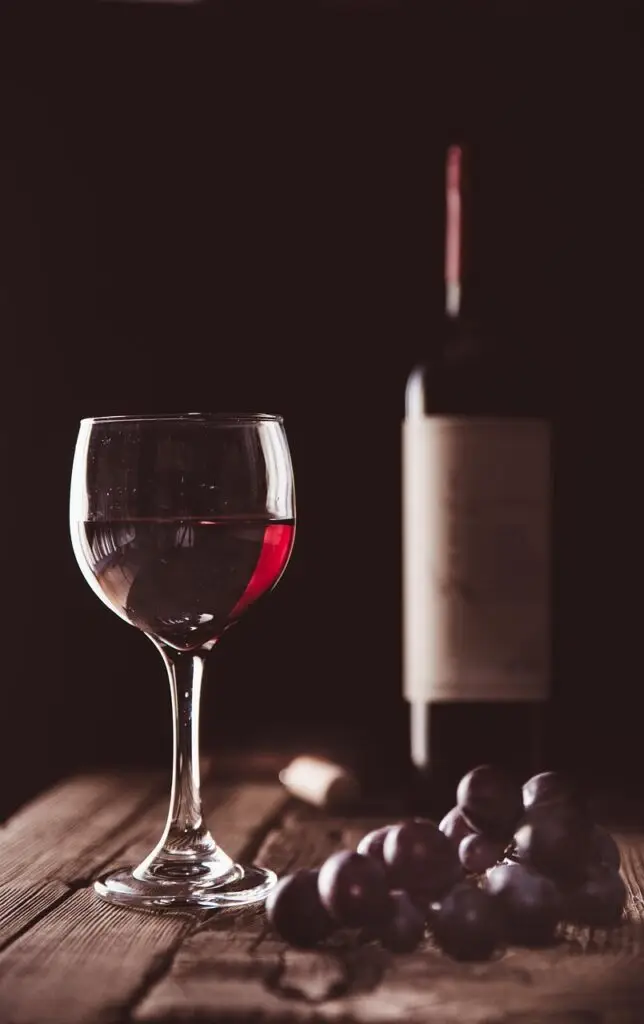wine, bottle, grapes, glass, red wine, wine glass, wine bottle, stemware, glassware, drink, beverage, alcoholic drink, still life, wine, wine, wine, wine, wine, red wine, still life, still life
